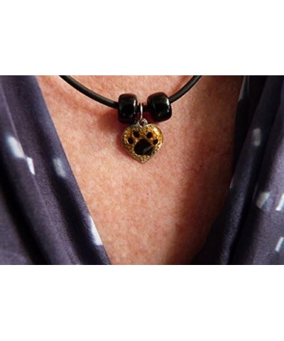 Enamel Painted Topaz and Black Colored Paw Print Heart Necklace $18.40 Necklaces